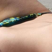 Sophie Monk seins nus à la plage