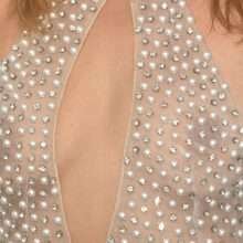Fancy Alexandersson seins nus par transparence à Paris