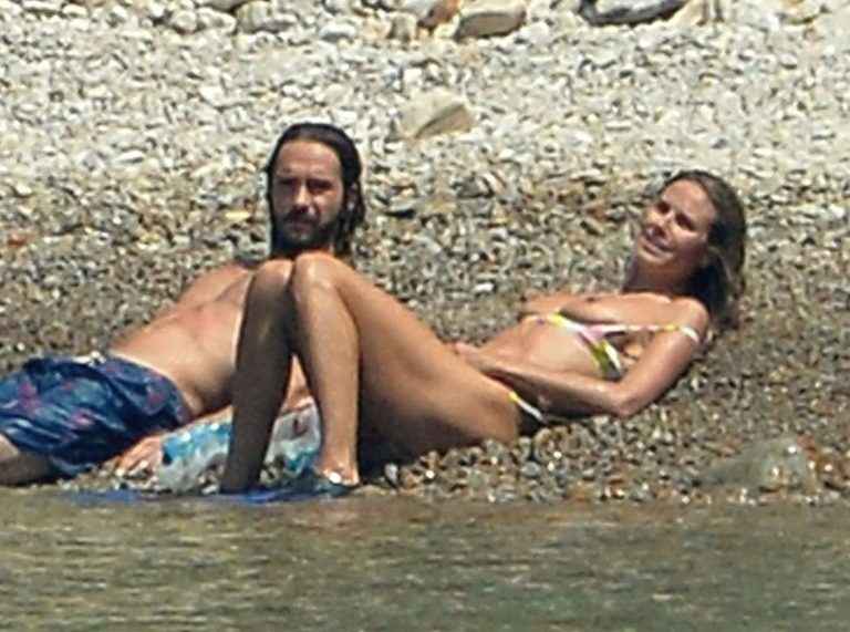 Heidi klum, bikini et seins nus en Italie